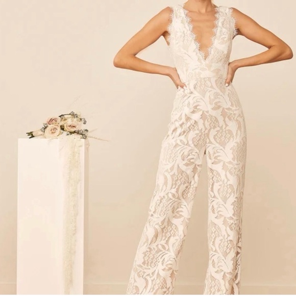 I have 2 jumpsuits! one in a sz LG and one in a XL! - Picture 1 of 4